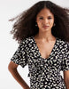 Vero Moda Easy Joy Short Sleeve Bow Front Mini Dress In Black Ditsy Daisy Print