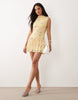 Printed Polka Dot Ruched Drop Waist Circle Mini Dress With Grown In Neck In Lemon And Blue