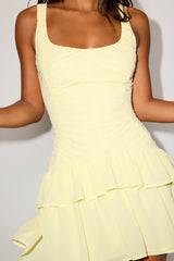 Castoria Light Yellow Pleated Tiered Mini Dress