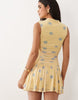 Printed Polka Dot Ruched Drop Waist Circle Mini Dress With Grown In Neck In Lemon And Blue