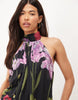 Dropped Hem Printed Stretch Chiffon Halter Maxi Dress In Black Floral